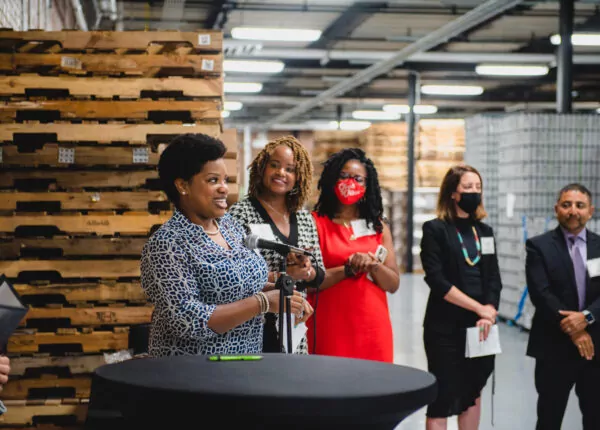 Woman speaks at networking event.